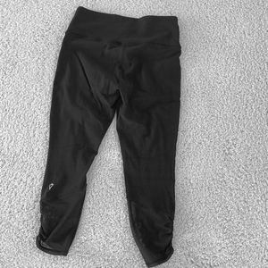 black ivivva pants with lace at the bottom